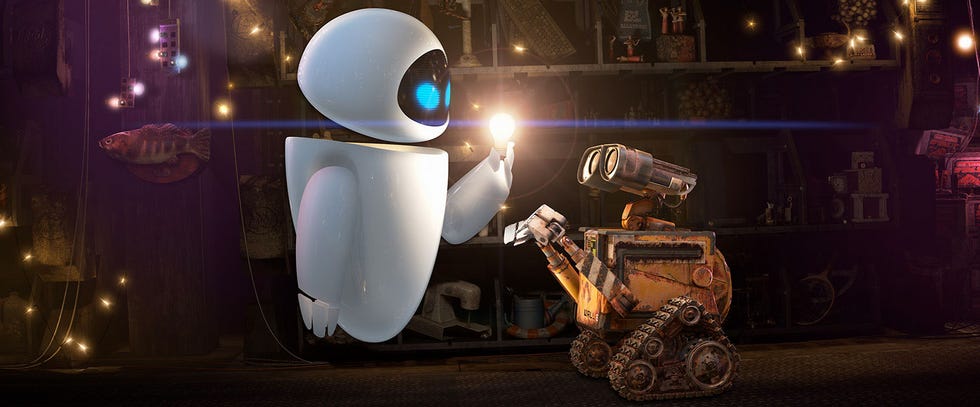 eve shows wall e a spark of light in a scene from wall e a good housekeeping pick for best valentine's day movies for kids