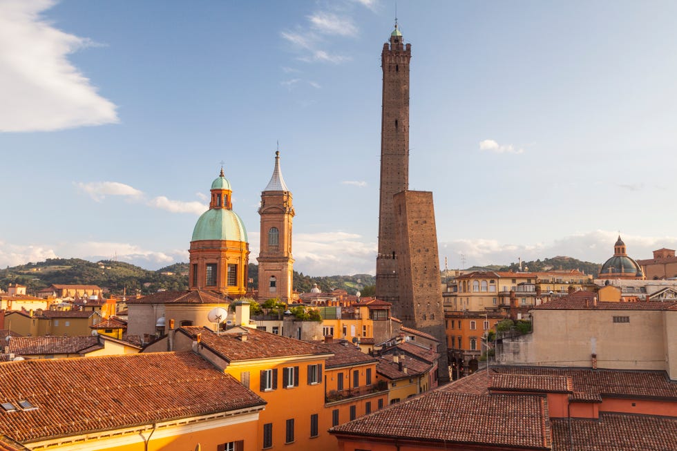 the asinelli and garisenda towers in bologna they are found in the historic centre of the city which has been designated a world heritage site by unesco