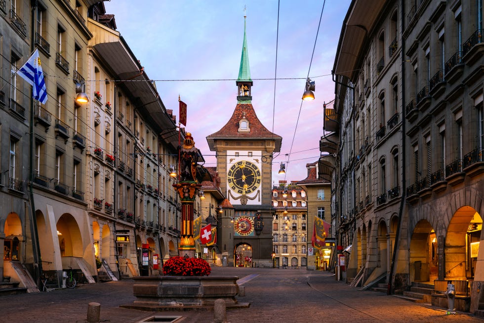 the famous zytglogge, astronomical clock in altstadt old town of bern, the capital of switzerland this photograph was taken at sunrise along kramgrasse street