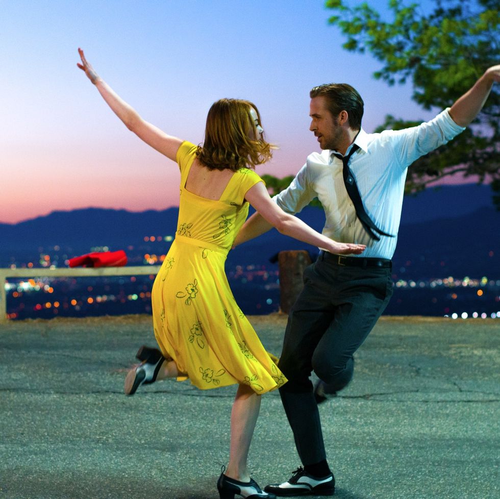 emma stone and ryan gosling dance in a scene from la la land, a good housekeeping pick for best romantic movies