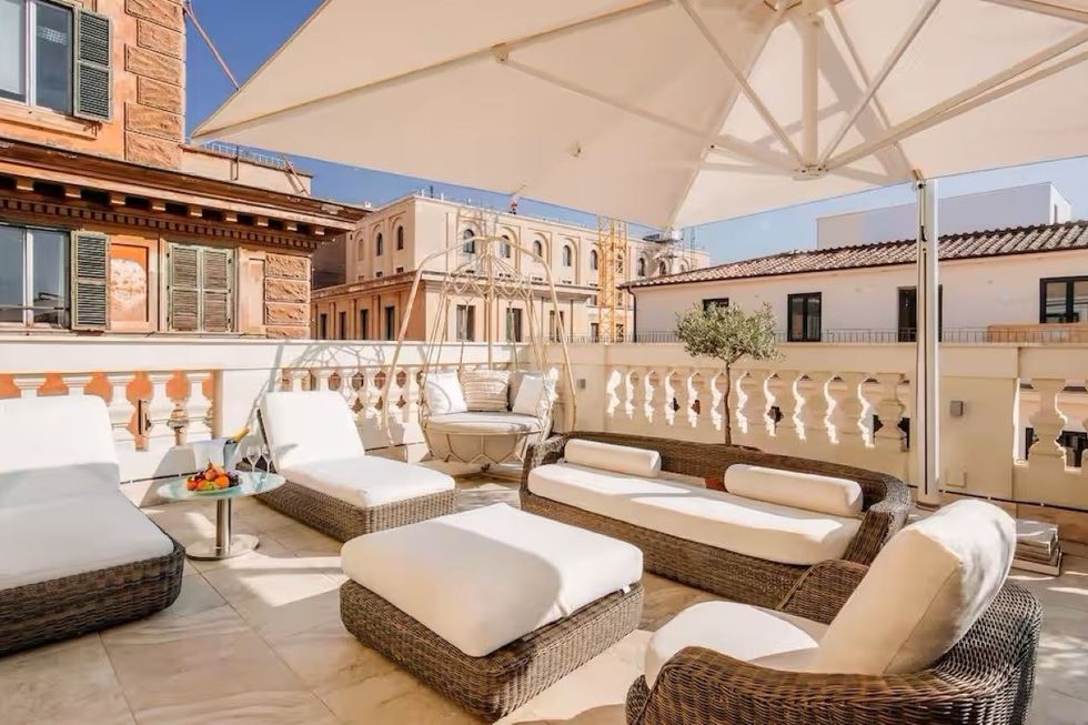 sun terrace with loungers at the aleph rome hotel