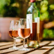 two glasses rose wine on outdoor table