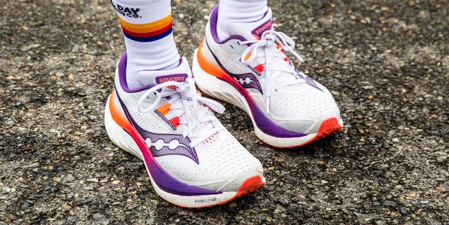 running shoes in vibrant colors on a textured surface
