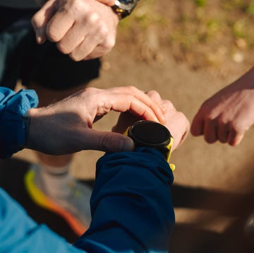 Best running watches a group of runners comparing running watches