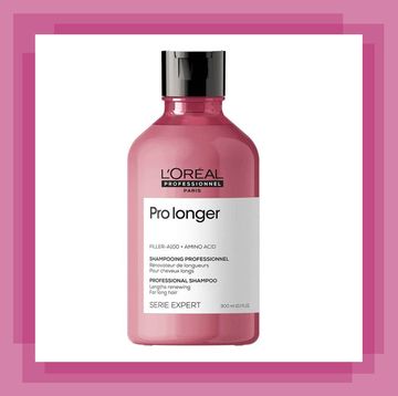 a pink bottle of shampoo