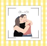 print of two girls hugging and mini photo printer