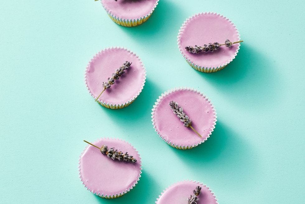 sugared lavender cupcakes with a lavender sprig on top