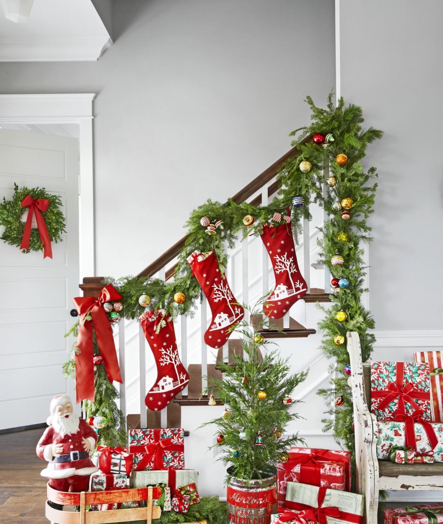 vintage inspired christmas banister decorations like shiny brite ornaments and stockings