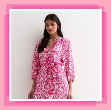woman in pink print summer dress
