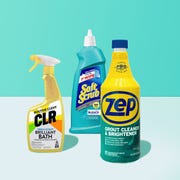 tile grout cleaners on blue backround. CLR, soft scrub and zep bottles tile grout cleaners on blue backround clr, soft scrub and zep bottles