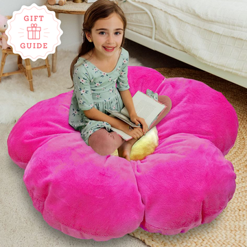 the butterfly craze daisy floor pillow and disney doorables squishalots are two good housekeeping picks for best gifts for 5 year olds