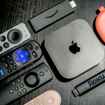 streaming devices arranged on a table, and the fire tv stick lite