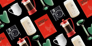 collection of lifestyle products including a book coffee press jade roller and other wellness items