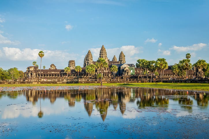 famous cambodian landmark and tourist attraction angkor wat with reflection in water cambodia, siem reap