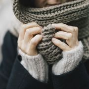 woman wearing knit scarf