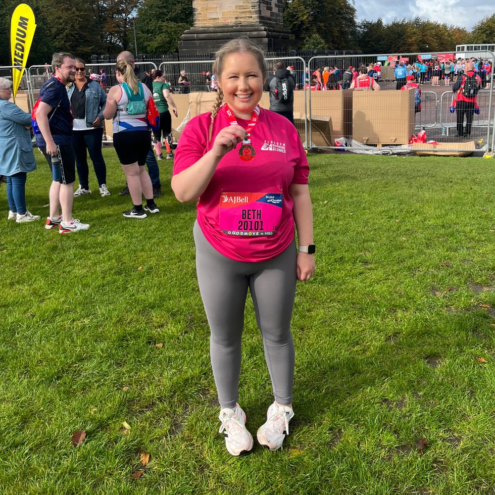 participant celebrating after completing a running event