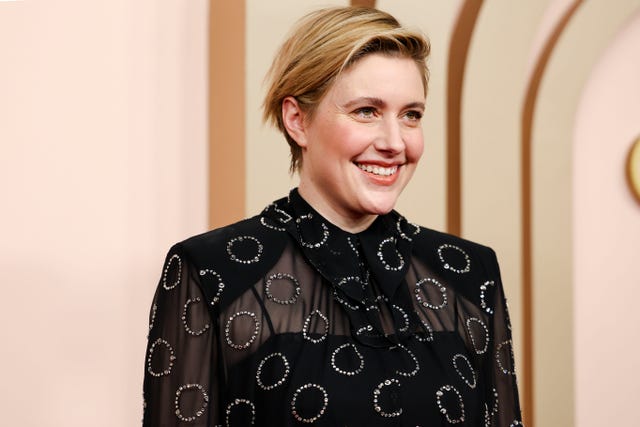 Greta Gerwig sparkles in cinched midi shirt dress