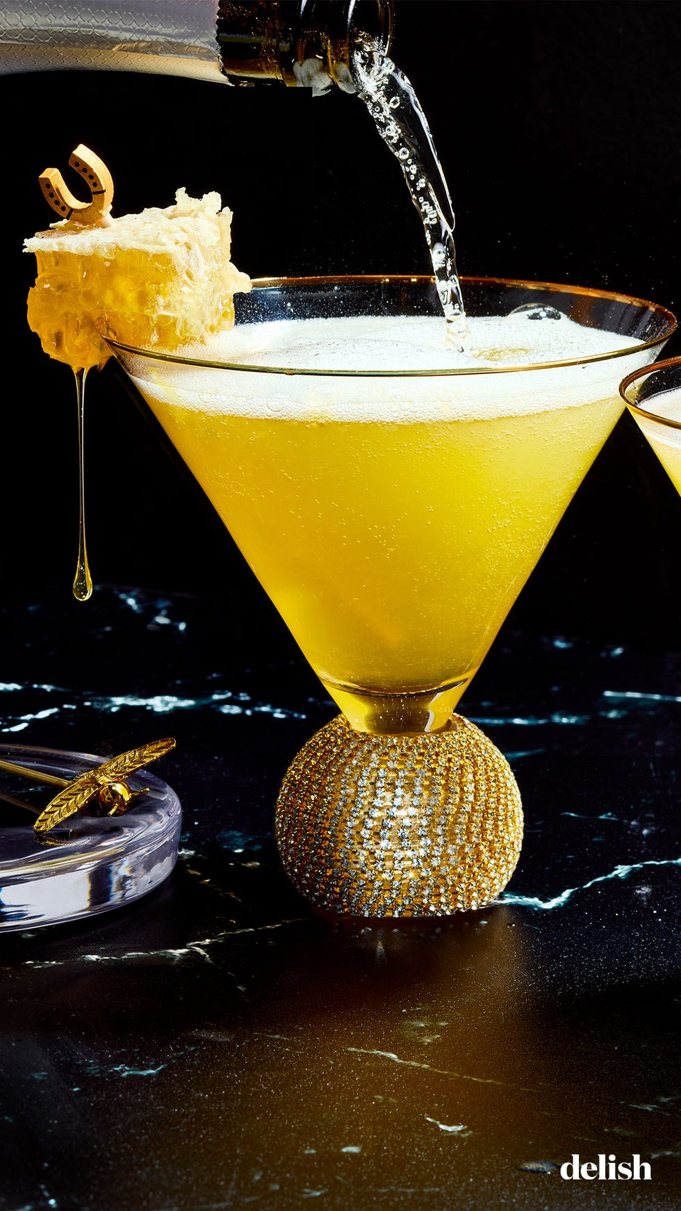 a blend of honey, tequila, peach nectar, and lemon juice makes this cocktail the perfect balance of sweet and tangy, while the prosecco keeps it light