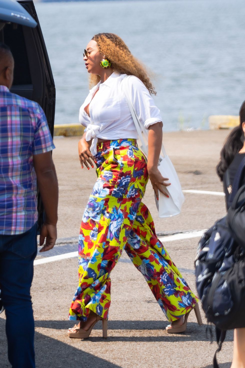 Beyoncé Wears Floral Print Pants with a Telfar Tote for a Date with Jay Z  in Brooklyn