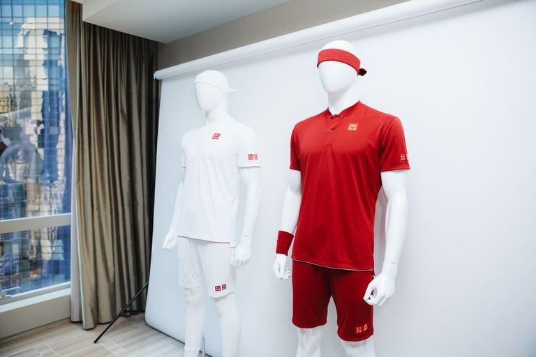 White, Clothing, Red, Uniform, Sleeve, Sportswear, Room, T-shirt, Sports uniform, Mannequin, 