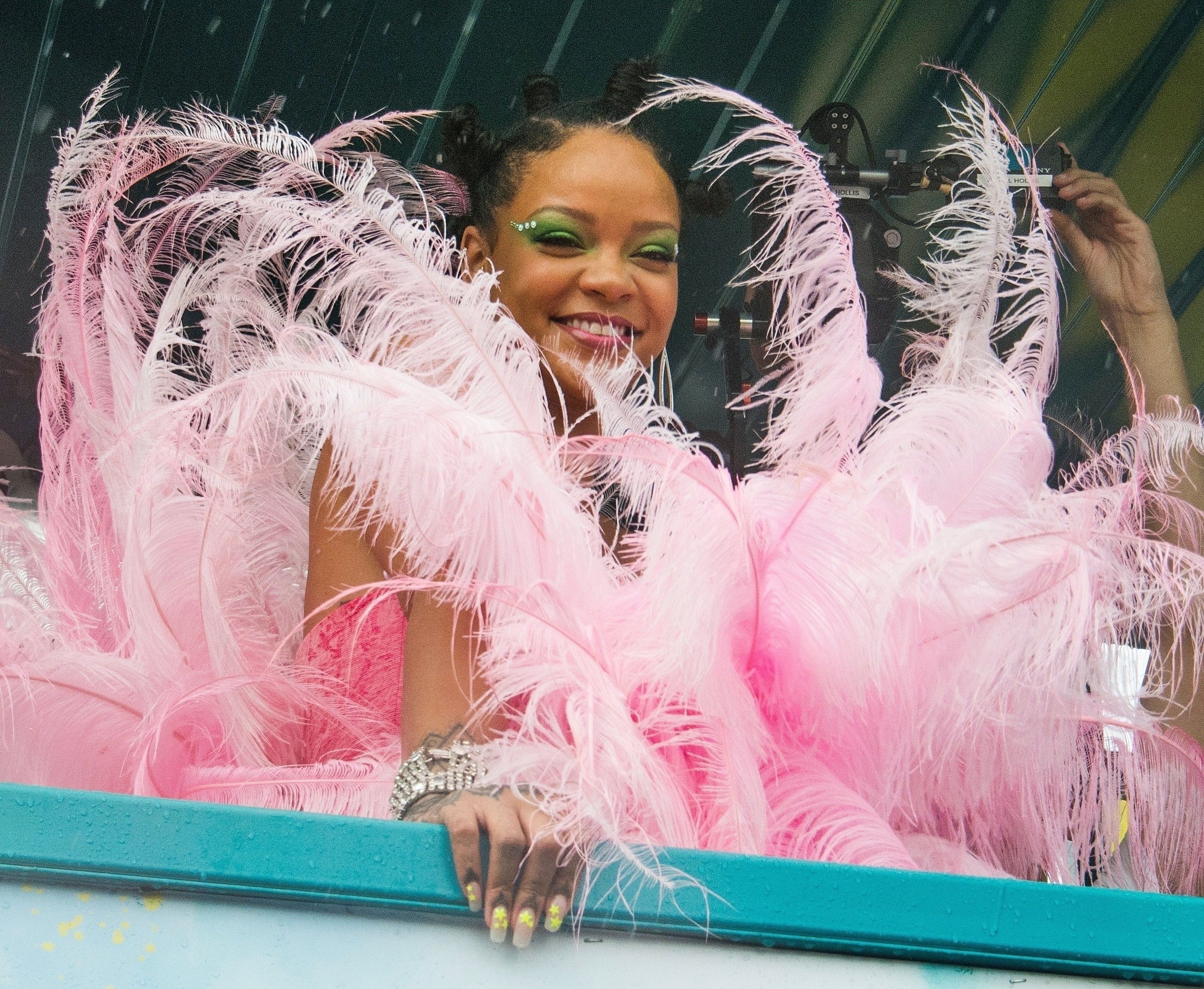 Rihanna Ditches Tiny Purses With a Giant Bottega Clutch