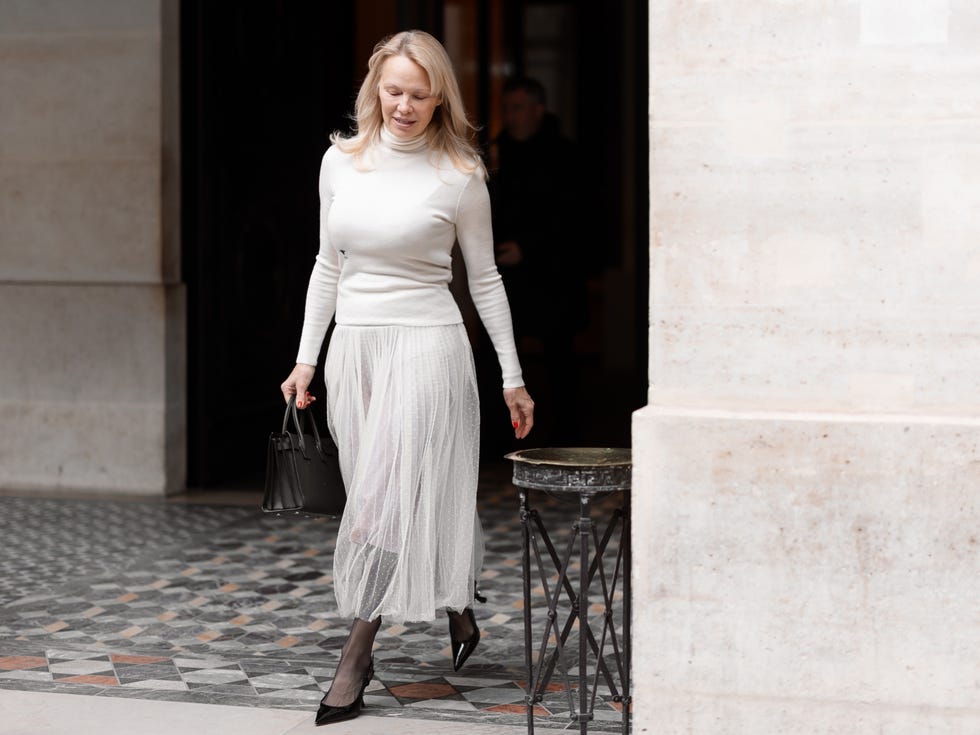 pamela anderson wearing tulle skirt in paris fashionable individual walking outside in a stylish outfit