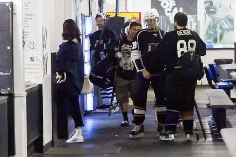 Justin Bieber with Selena Gomez at the ice rank.