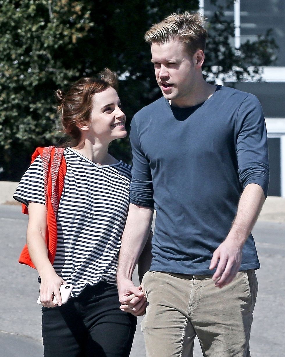 emma watson and chord overstreet holding hands and smiling