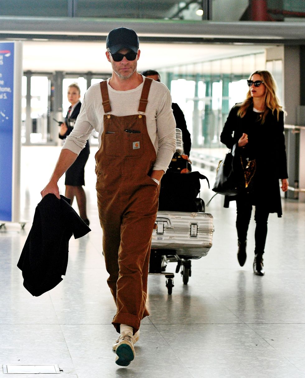 Chris Pine Overalls - Chris Pine Wears Carhartt Overalls to Airport