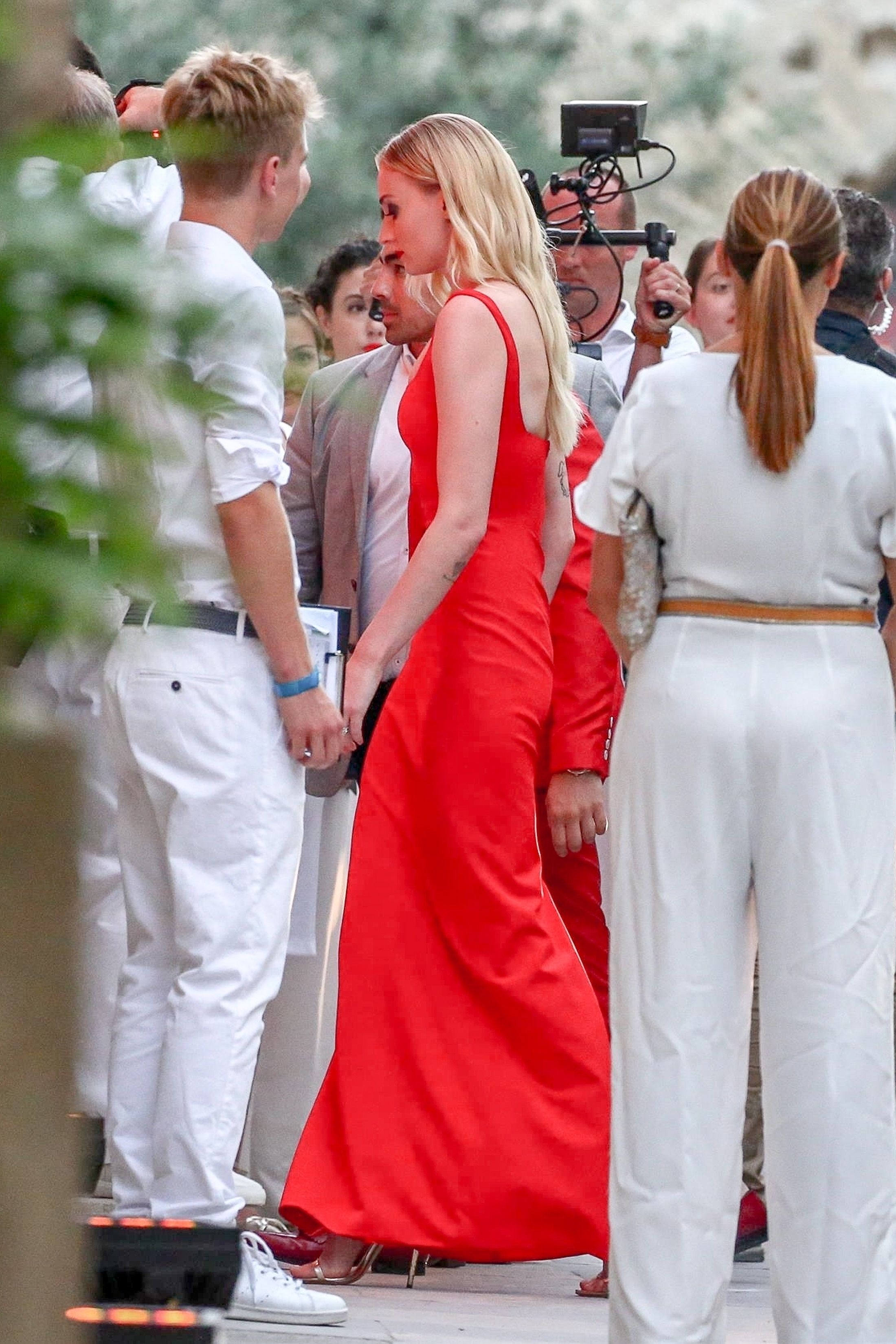 Sophie Turner Wears Red Dress to Wedding Rehearsal Dinner