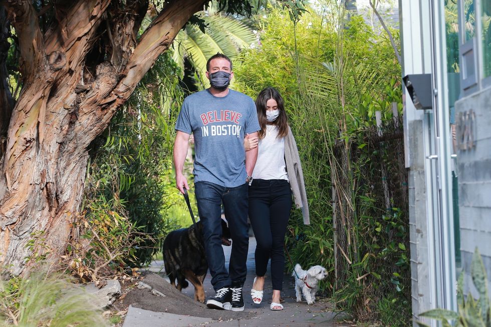 ben affleck and ana de armas step out wearing protective masks to walk her dogs amid the coronavirus pandemic quarantine