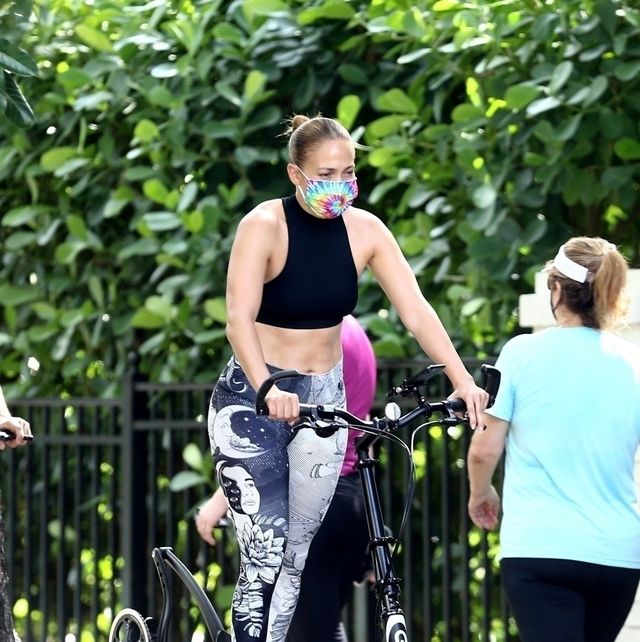 Jennifer Lopez in cream gold speckle ombre leggings and sports bra in Miami  on August 20 ~ I want her style - What celebrities wore and where to buy  it. Celebrity Style