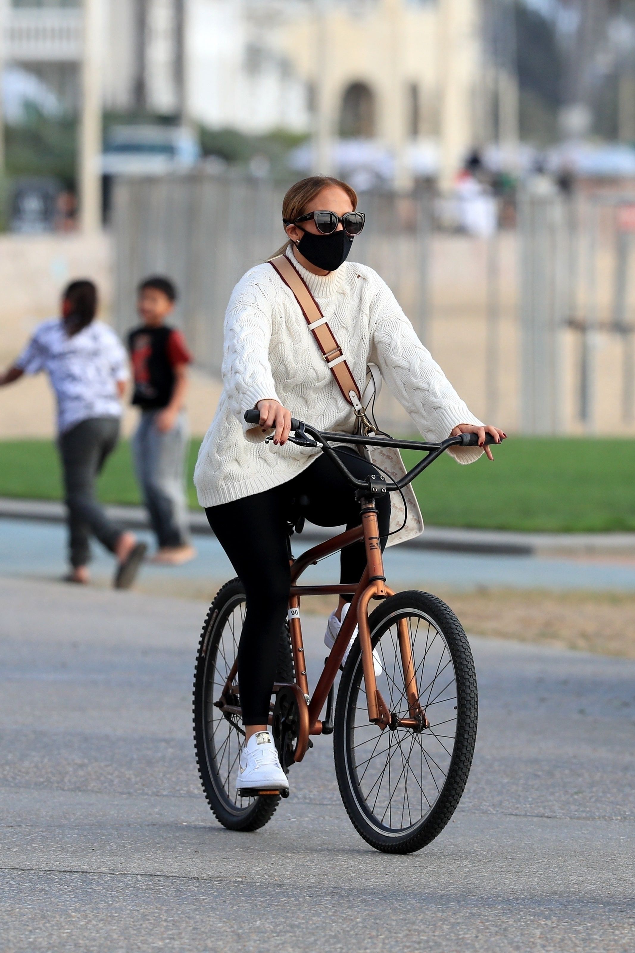 Jennifer Lopez Looks Chic on a Bike Ride with Twins Emme and Max