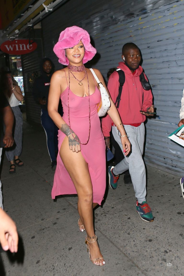 rihanna in all pink ensemble and bucket hat