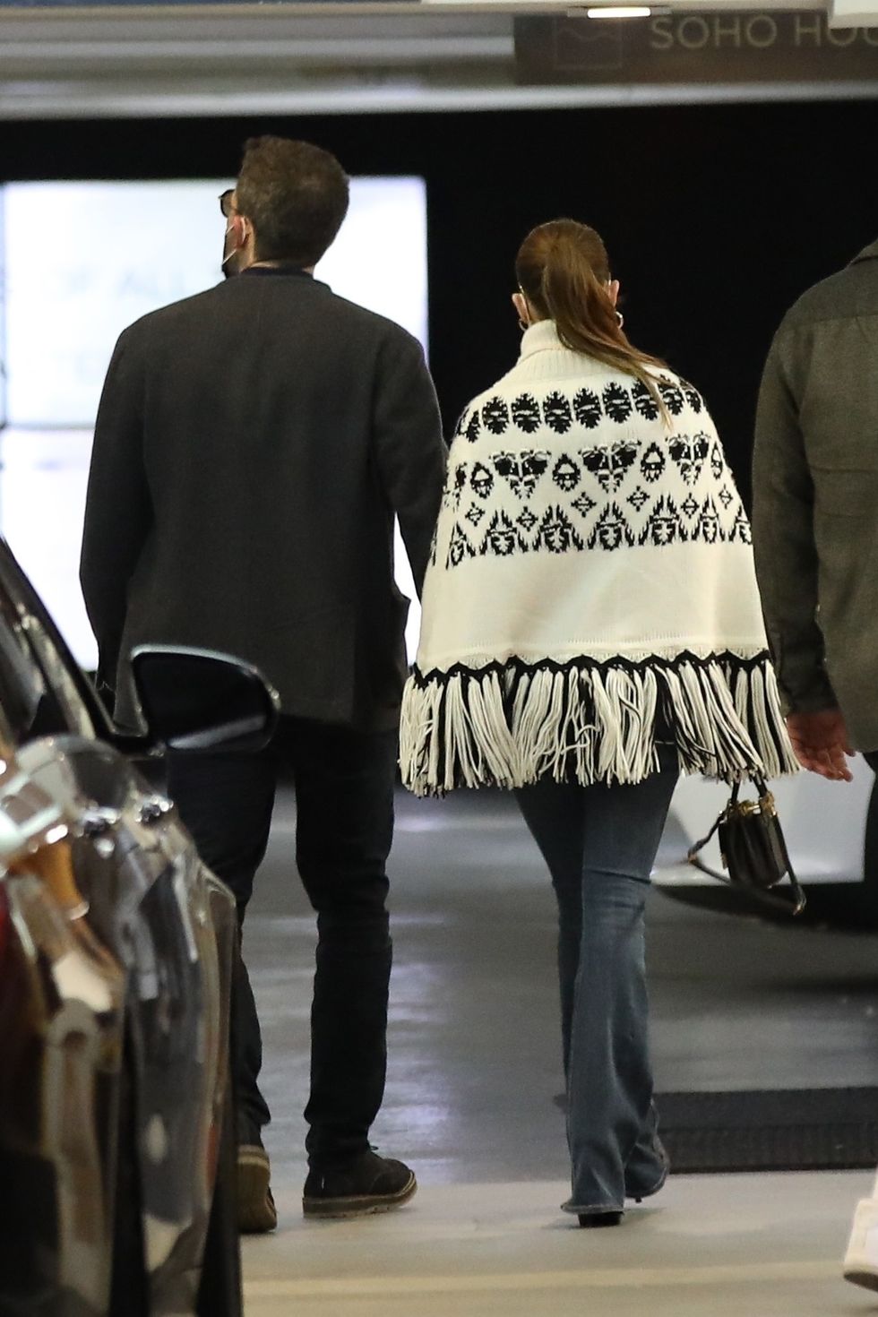 ben affleck and jlo in white poncho