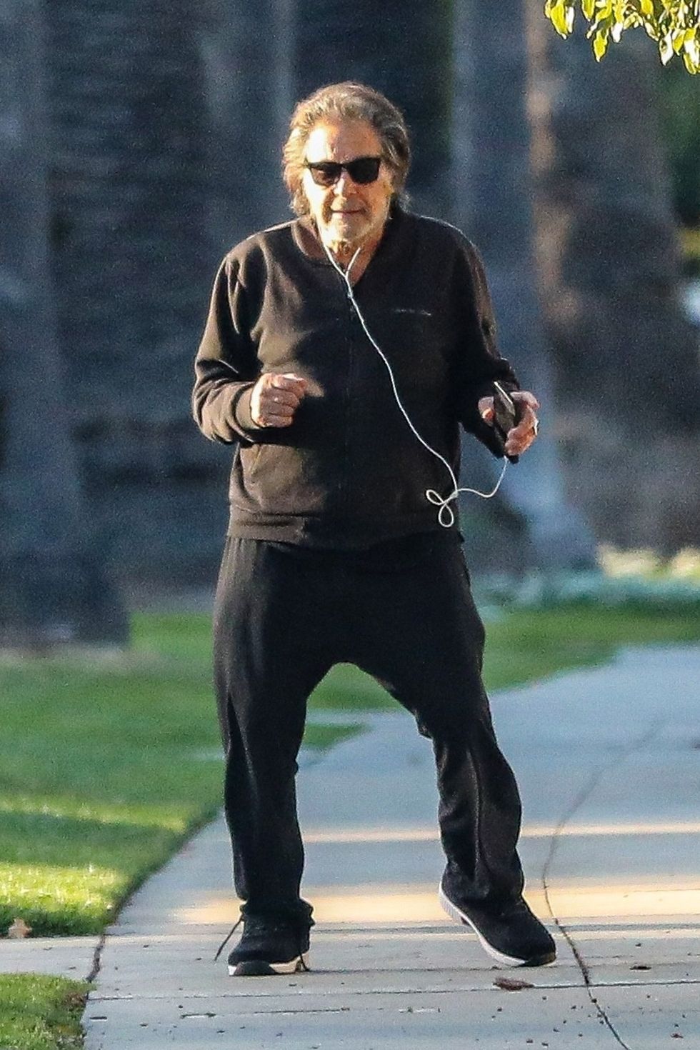 beverly hills, ca    exclusive    legendary actor al pacino feels the vibes and dances along to music on his headphones while out for a walk around his beverly hills neighborhood on tuesday afternoon the legendary actor appeared to have revived some of his famous tango moves from scene of a womanpictured al pacinobackgrid usa 10 february 2022 byline must read backgridusa 1 310 798 9111  usasalesbackgridcomuk 44 208 344 2007  uksalesbackgridcomuk clients   pictures containing childrenplease pixelate face prior to publication