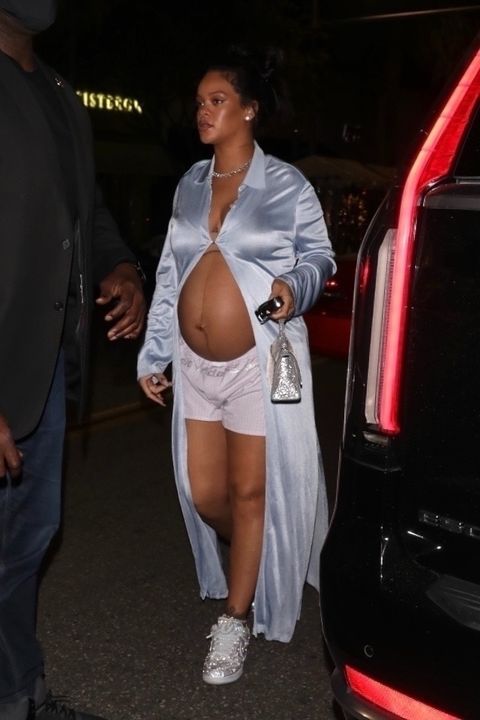 beverly hills, ca    rihanna's growing baby bump plays peek a boo while stepping out for dinner in beverly hills the mother to be kept it simple yet chic in an open long silk blouse paired with shorts and sneakerspictured rihannabackgrid usa 9 april 2022 byline must read iamkevinwongcom  backgridusa 1 310 798 9111  usasalesbackgridcomuk 44 208 344 2007  uksalesbackgridcomuk clients   pictures containing childrenplease pixelate face prior to publication