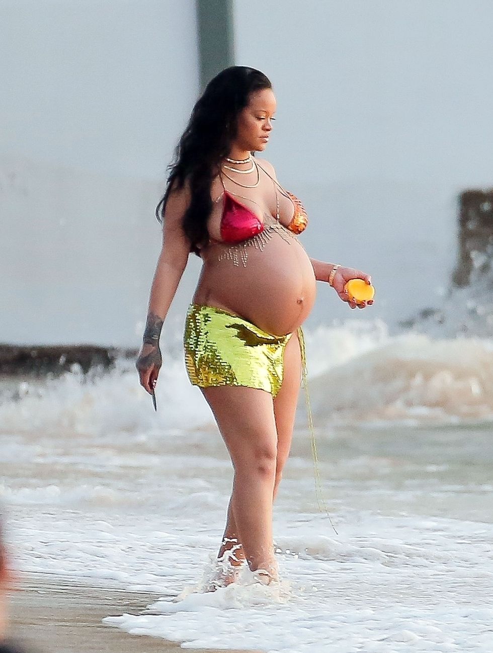 Rihanna Wearing a Sheer YSL Bra Top and Alexander Wang Shorts, Rihanna  Gives Her Pregnancy Style a Y2K Spin in a Fuzzy Tube Top