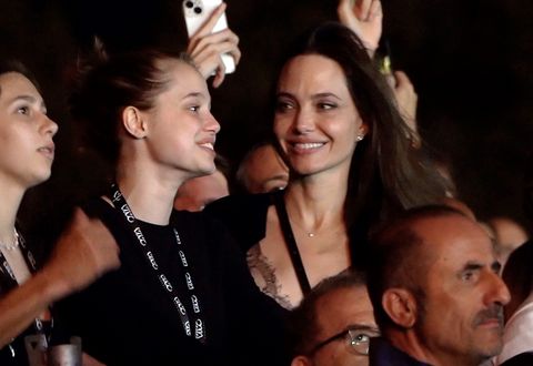 angelina jolie and shiloh smile in audience