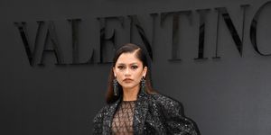 zendaya valentino logo short suit sheer jumpsuit front row paris fashion week