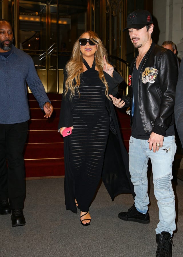 Who made Mariah Carey's black dress, sunglasses, wide belt, and crystal  pumps? – OutfitID