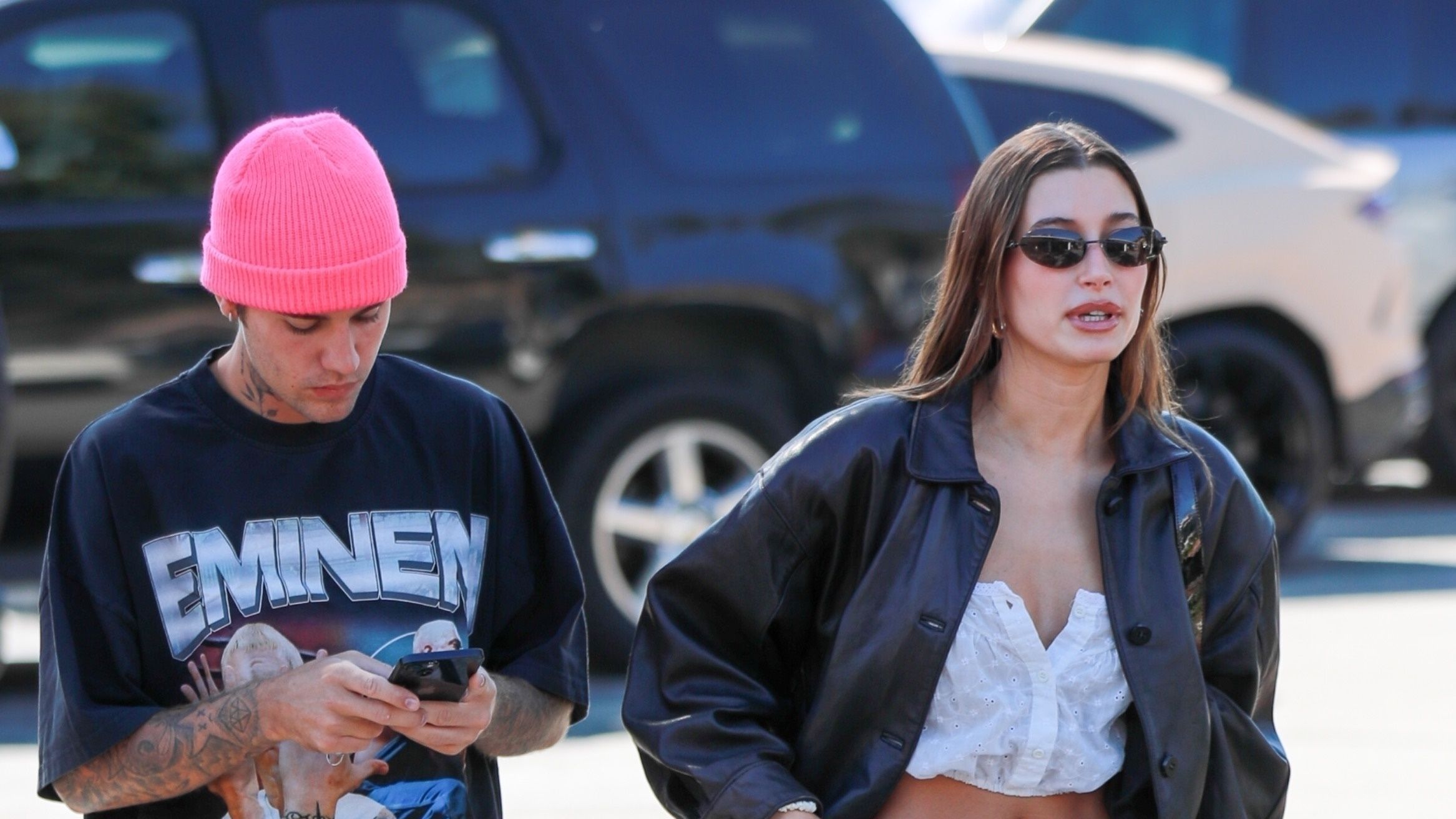 Hailey Bieber Grunged Up a Classic '80s Workwear Look With Low-Rise, Zip-Up  Pants