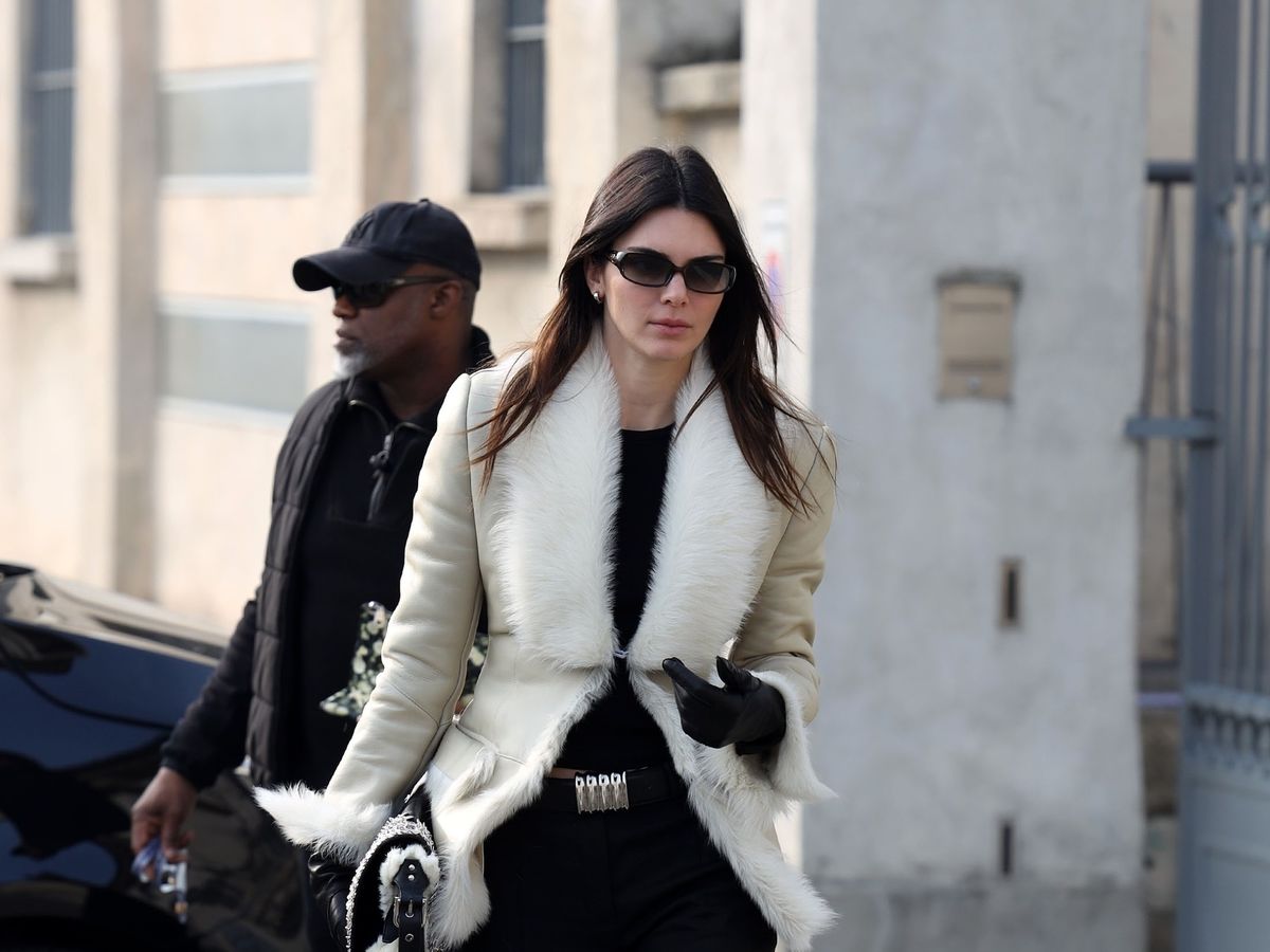 Wearing Her Sunglasses With a Mini Shearling Jacket