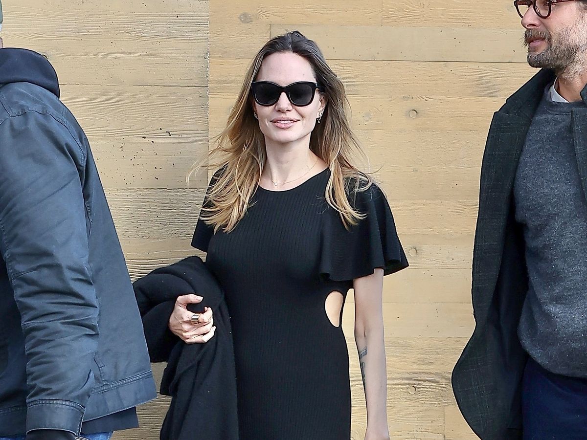 Angelina Jolie Perfects Transitional Dressing in Black Maxi Dress