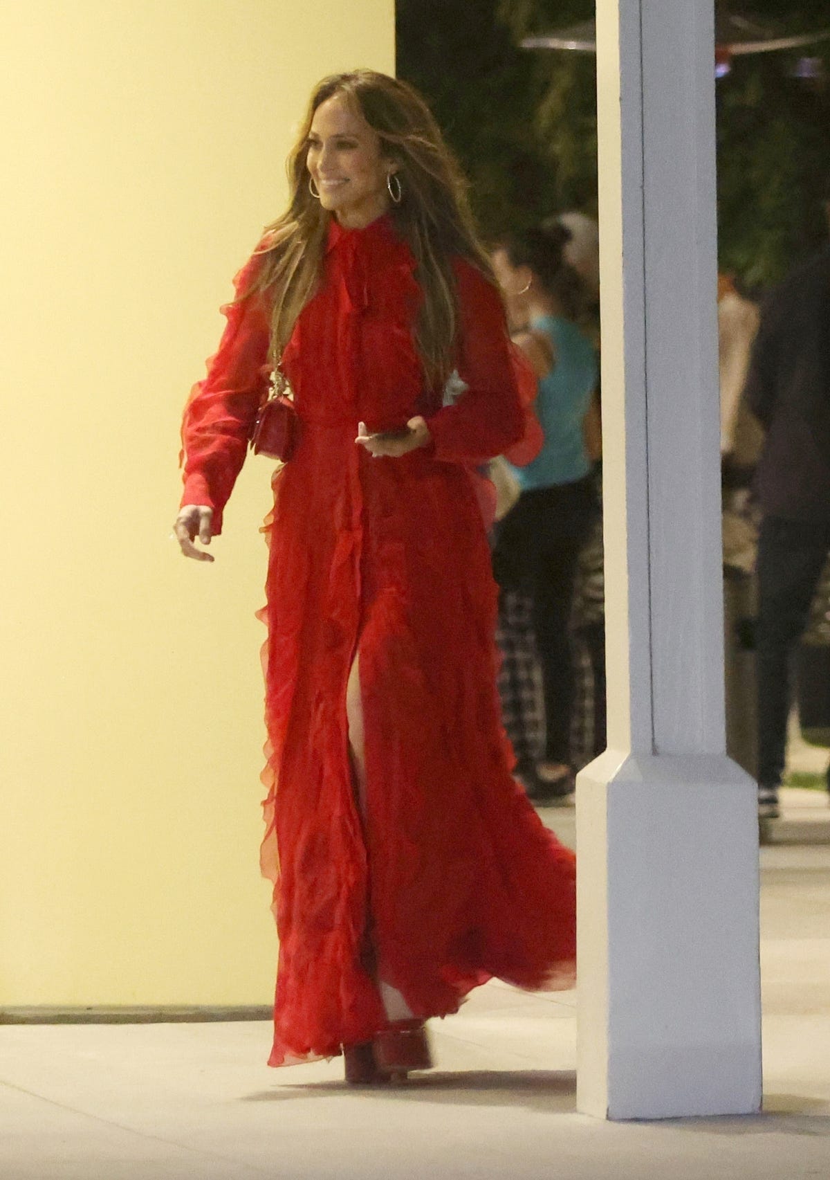 Jennifer Lopez Wears a Red-Hot Ruffled Maxi Dress to Reunite