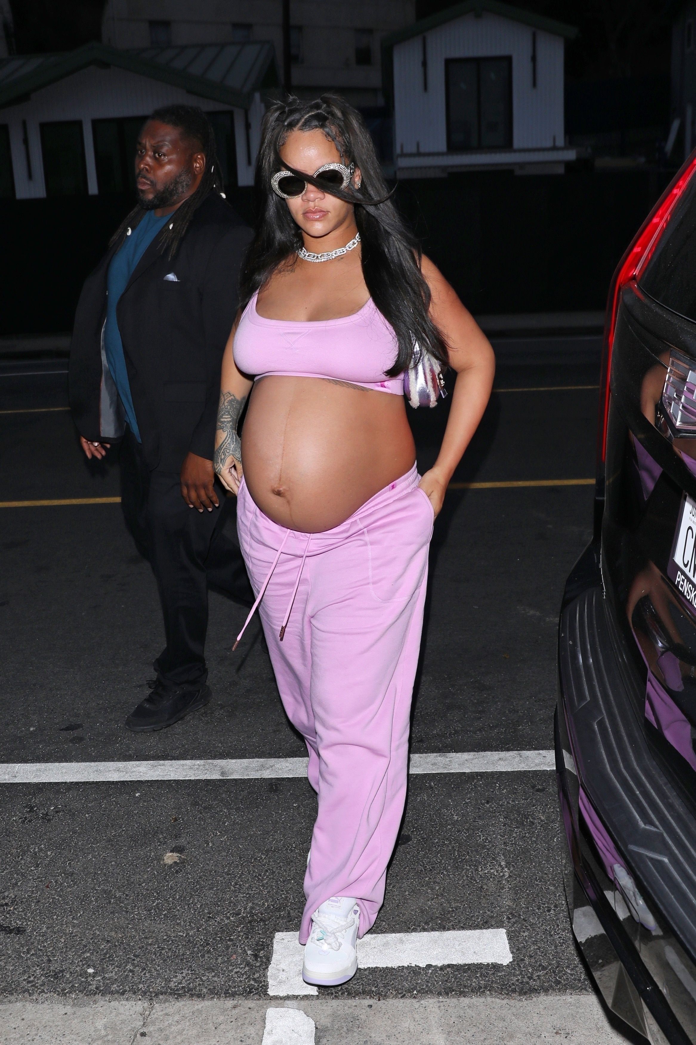 Pregnant Rihanna Baby Bump in Pharrell's Louis Vuitton Menswear