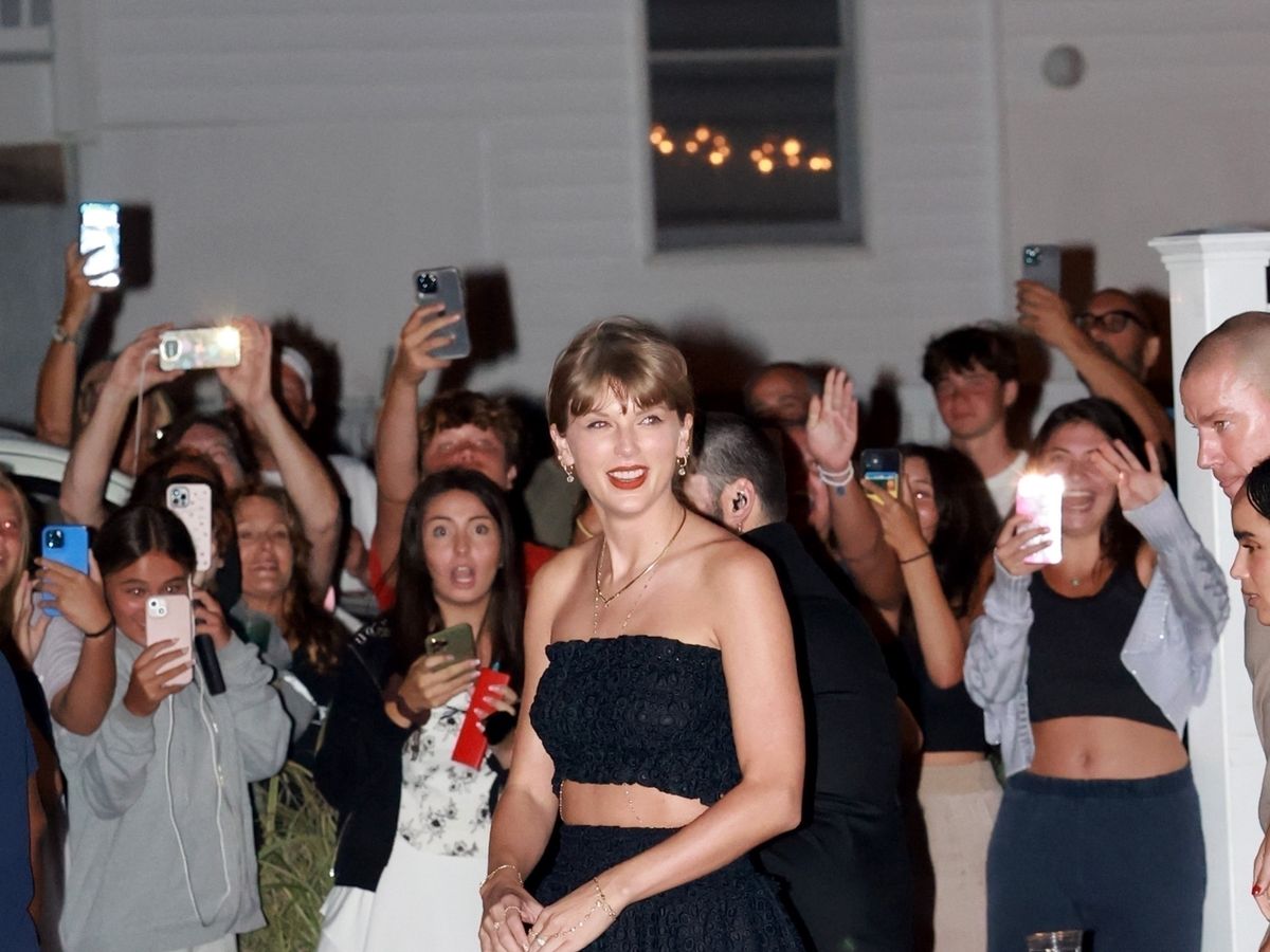 See Taylor Swift Do Wedding Guest Dressing in a Lacy Black Skirt Set and  Body Chain