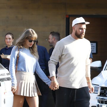 a man and woman walking a man and woman walking