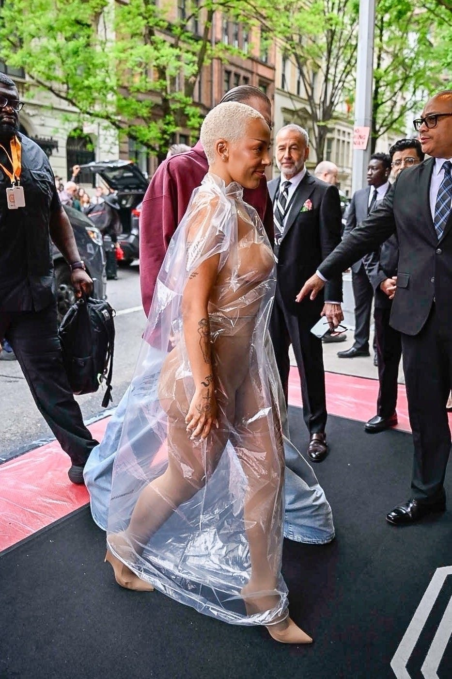 Doja Cat Wears Nipple Pasties Under a Plastic Bag Ahead of Met Gala