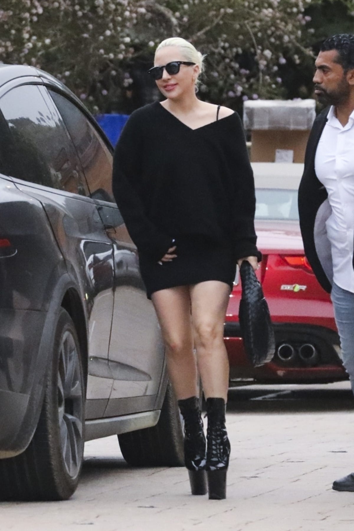 Only Lady Gaga could make a black sweater dress look so unusual